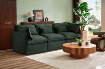 Modern living room with a dark green sofa